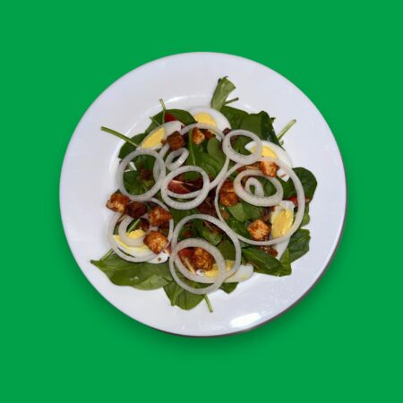 Spinach salad with Green Background